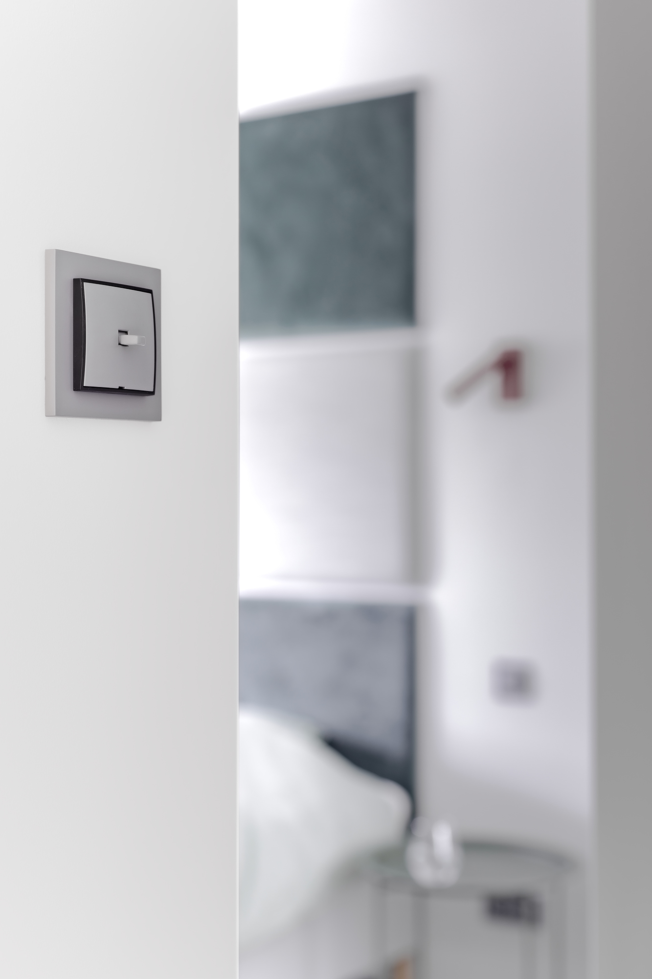 Włączniki światła są w tych wnętrzach, jednymi z wyróżniających je detali.